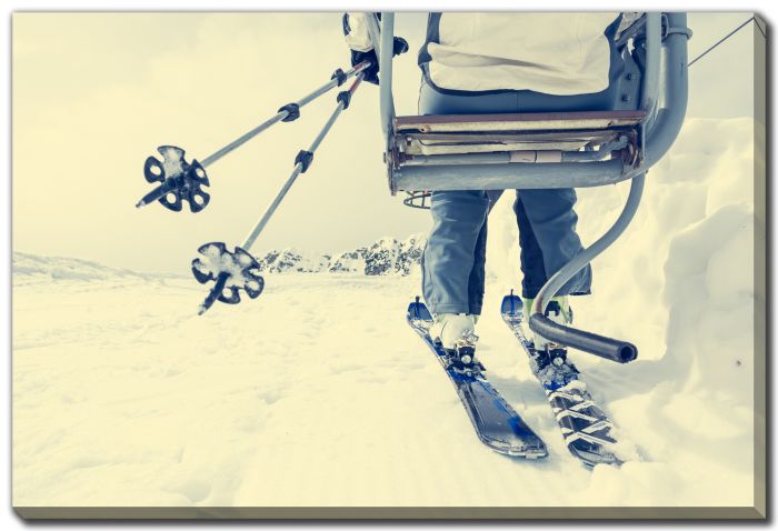 Skier Riding A Lift